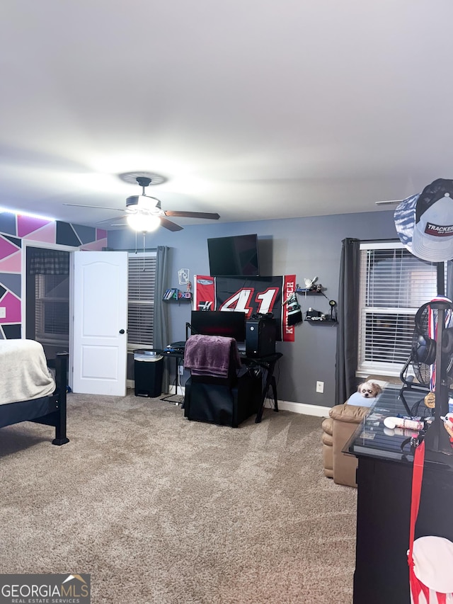 carpeted bedroom with ceiling fan