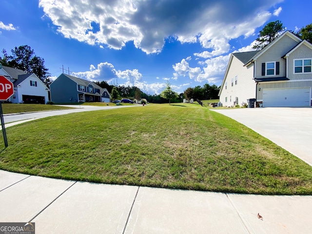 view of yard featuring a garage