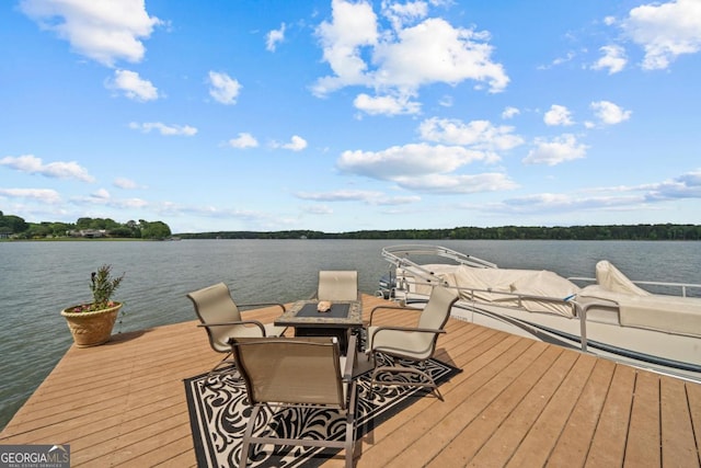 dock area featuring a water view