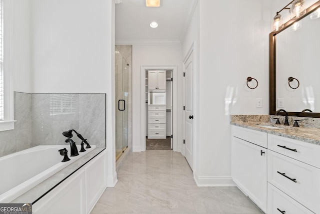 bathroom with independent shower and bath, vanity, and ornamental molding