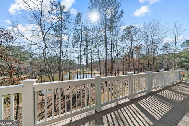 deck featuring a water view