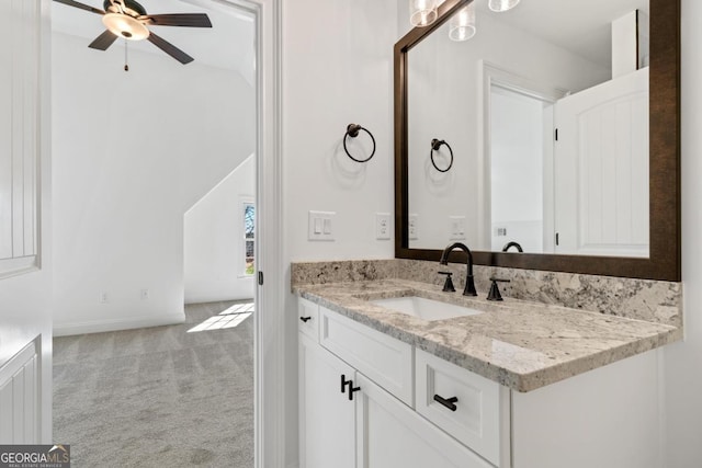 bathroom featuring vanity and ceiling fan