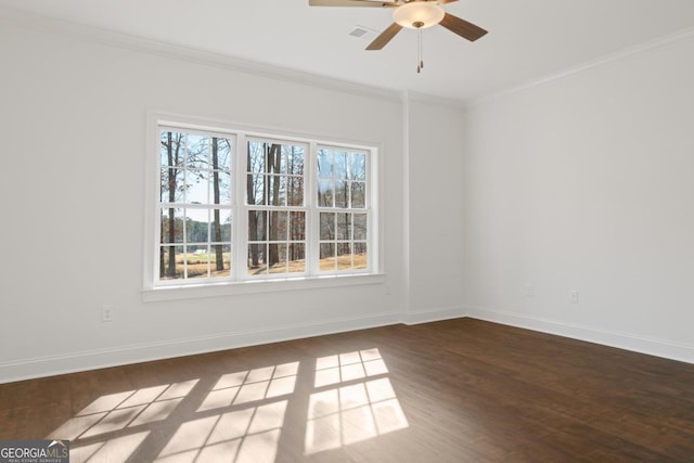 unfurnished room with hardwood / wood-style flooring, crown molding, and ceiling fan