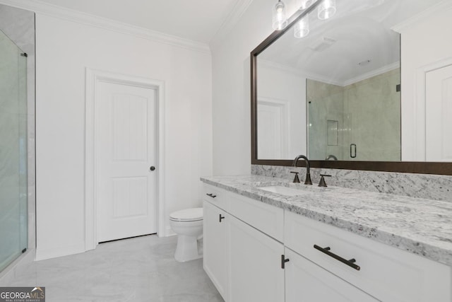 bathroom with crown molding, vanity, toilet, and a shower with door