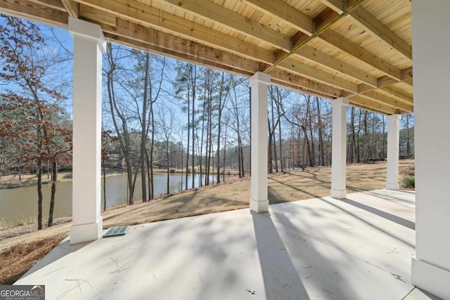 view of patio featuring a water view