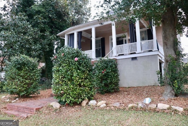 view of home's exterior featuring a porch