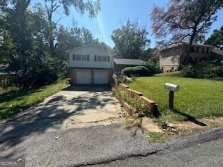 view of side of home featuring a yard