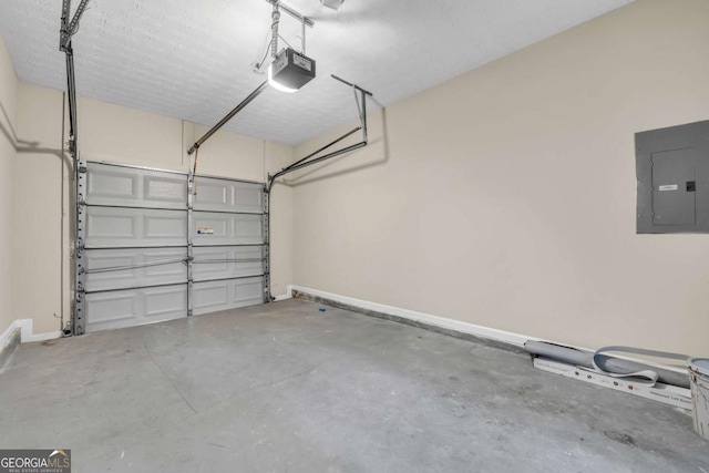 garage featuring a garage door opener and electric panel