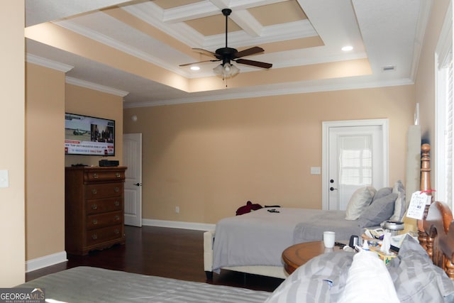 bedroom with coffered ceiling, ornamental molding, a raised ceiling, and dark wood-type flooring