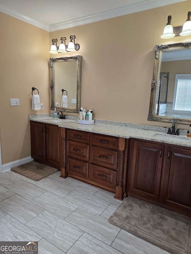 bathroom with vanity and crown molding