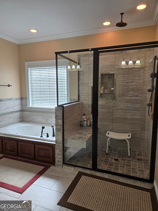 bathroom featuring tile patterned flooring, crown molding, and shower with separate bathtub