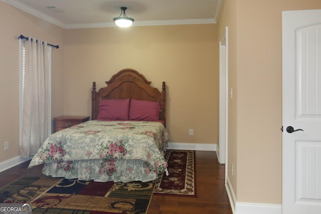 bedroom featuring crown molding and dark hardwood / wood-style flooring