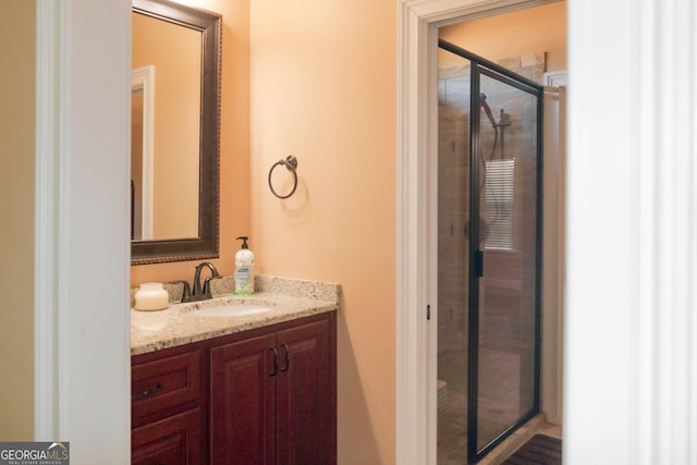 bathroom featuring vanity and walk in shower