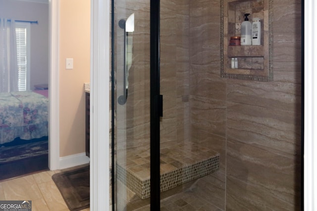 bathroom featuring tiled shower