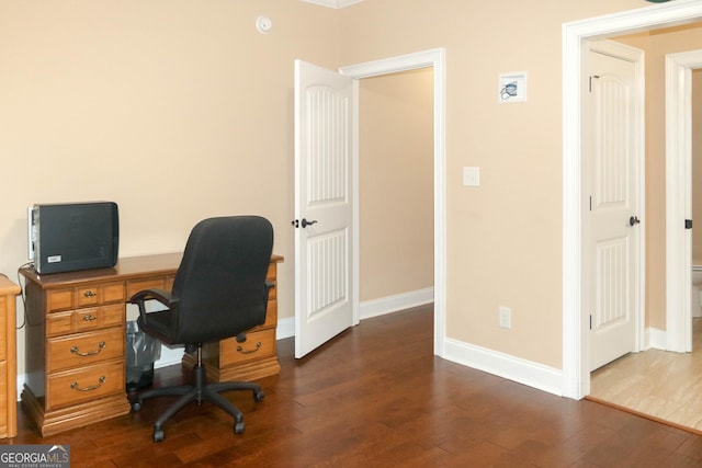 home office featuring dark hardwood / wood-style flooring