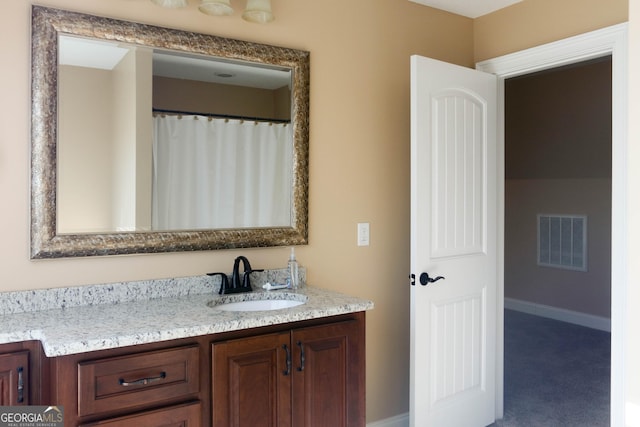 bathroom featuring vanity