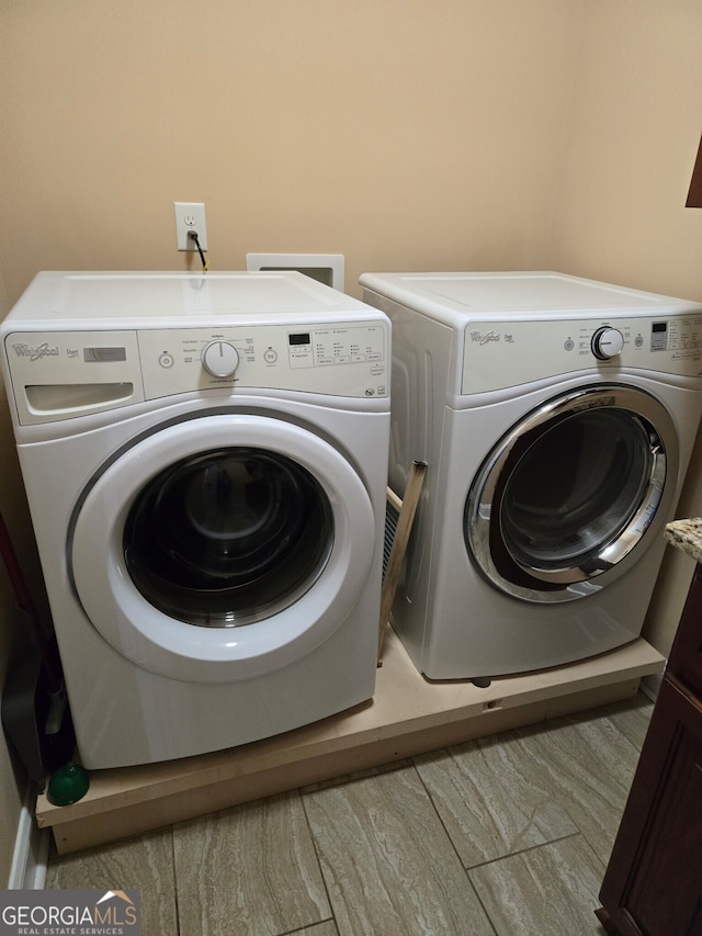 laundry room featuring washer and dryer