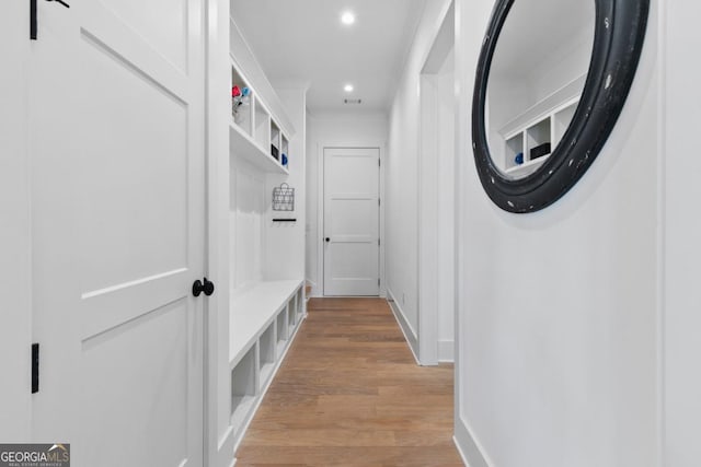 mudroom featuring light hardwood / wood-style flooring