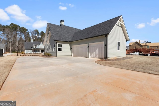 view of home's exterior with a garage