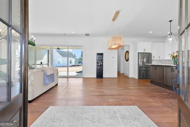 living room featuring dark hardwood / wood-style floors