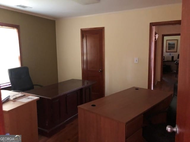 office with dark hardwood / wood-style flooring and ornamental molding