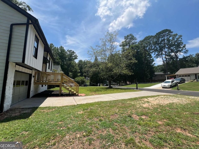 view of yard featuring a garage