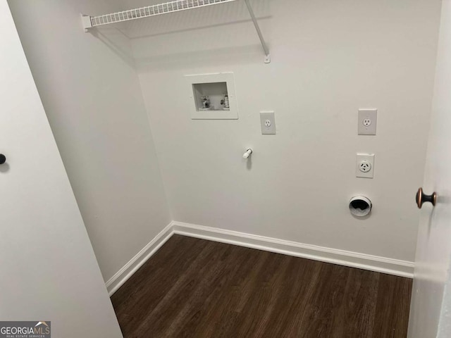 laundry area featuring hookup for a washing machine, gas dryer hookup, electric dryer hookup, and dark hardwood / wood-style flooring