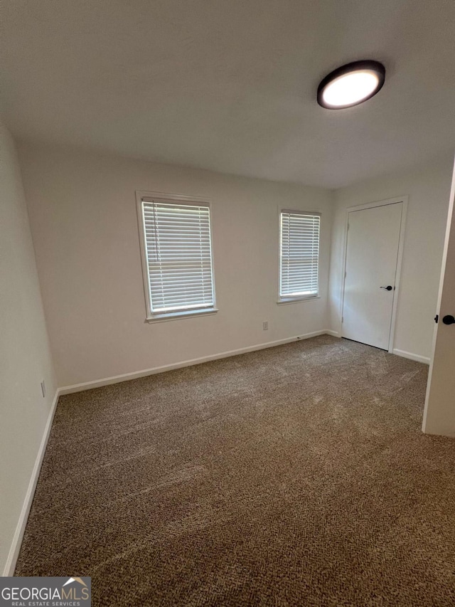 view of carpeted empty room