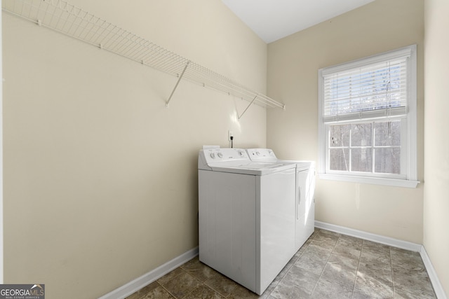 laundry area with washing machine and dryer