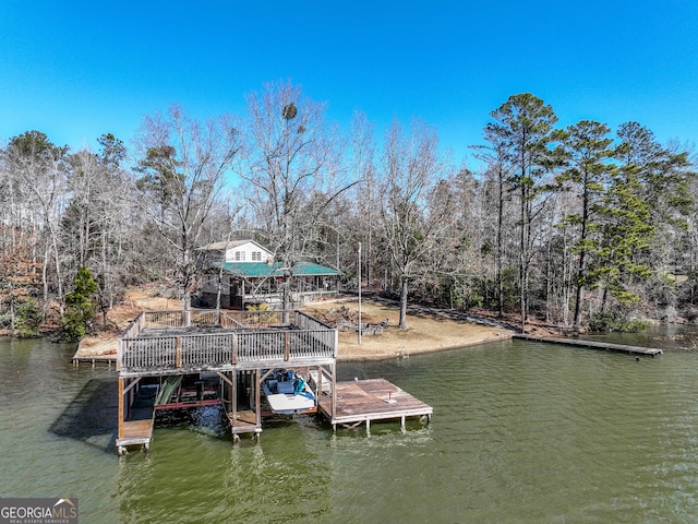 view of dock with a water view and boat lift