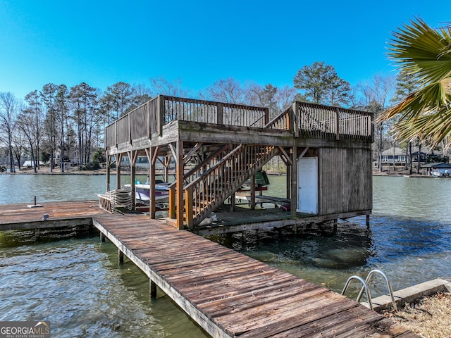 view of dock with a water view and stairs