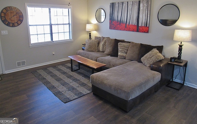 living room featuring dark hardwood / wood-style floors