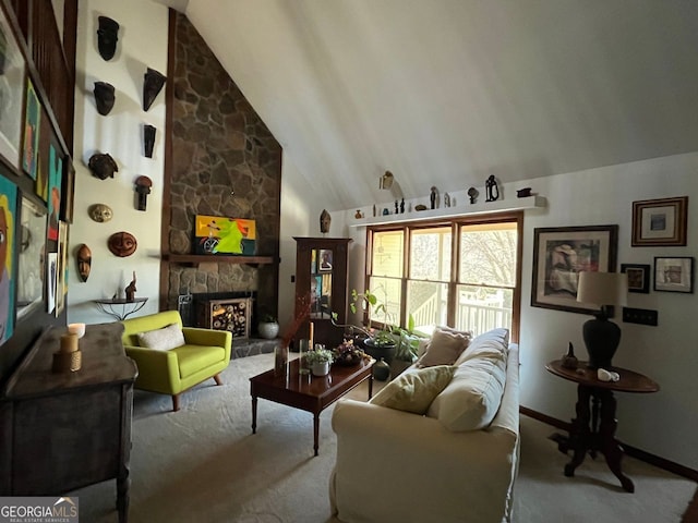 carpeted living room featuring a stone fireplace and vaulted ceiling