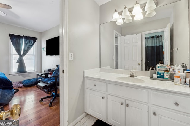 bathroom with vanity and tile patterned flooring