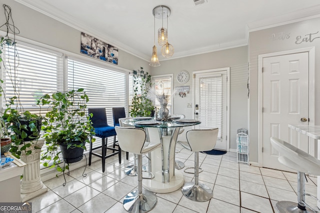 tiled dining space with ornamental molding