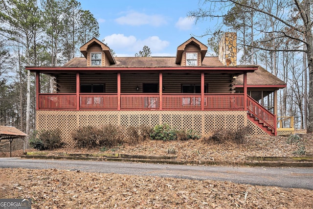 view of log cabin