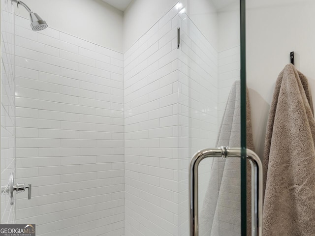 room details featuring a shower with shower door