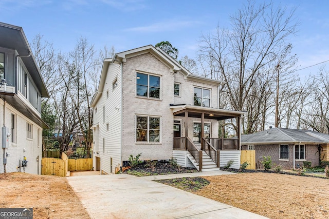 view of front of property featuring covered porch