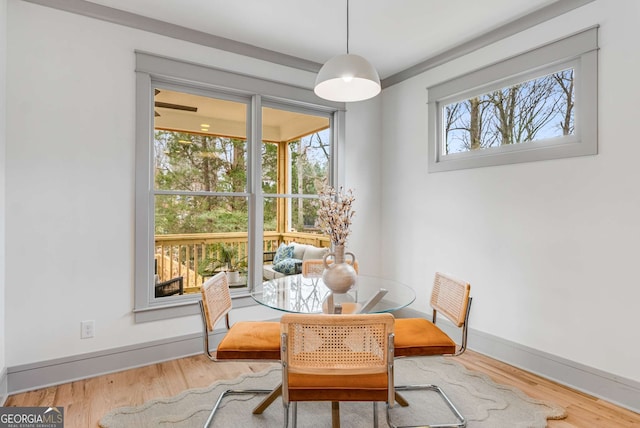 dining area featuring light wood-type flooring