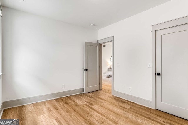 unfurnished bedroom featuring light hardwood / wood-style flooring