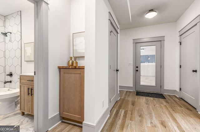 foyer featuring light hardwood / wood-style floors