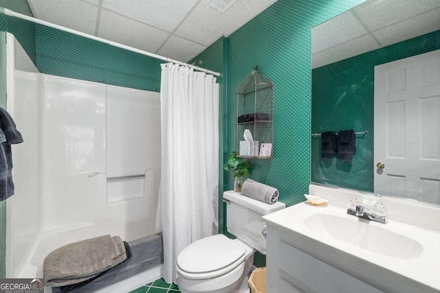 full bathroom with vanity, a paneled ceiling, toilet, and shower / tub combo with curtain