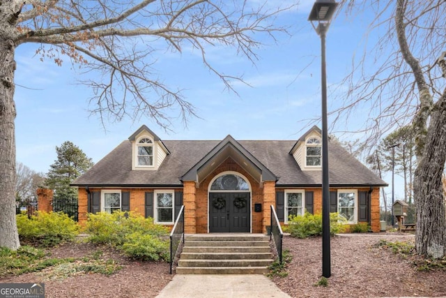 view of new england style home