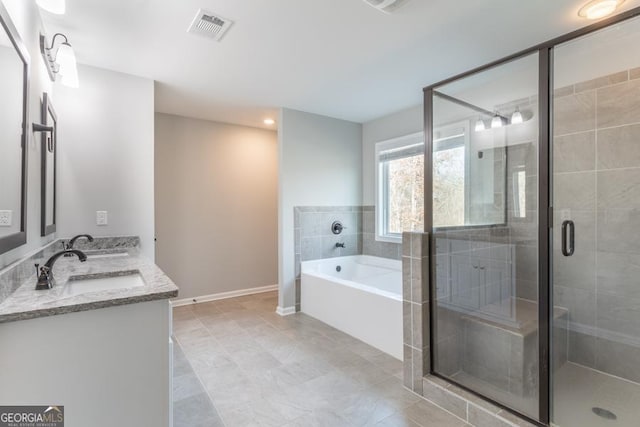 full bath featuring double vanity, visible vents, a sink, a shower stall, and a bath