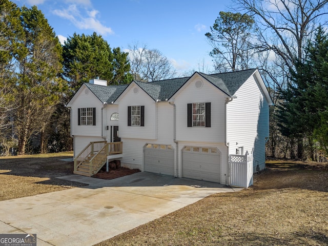 split foyer home featuring a garage