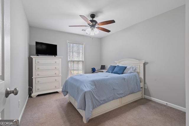 bedroom featuring ceiling fan and carpet flooring