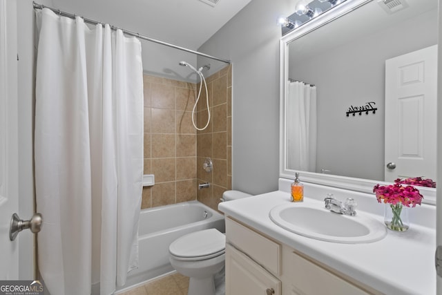 full bathroom featuring vanity, toilet, and shower / bathtub combination with curtain