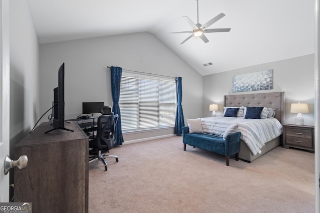 carpeted bedroom featuring ceiling fan and vaulted ceiling