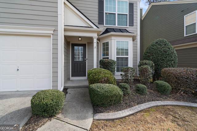 property entrance featuring a garage