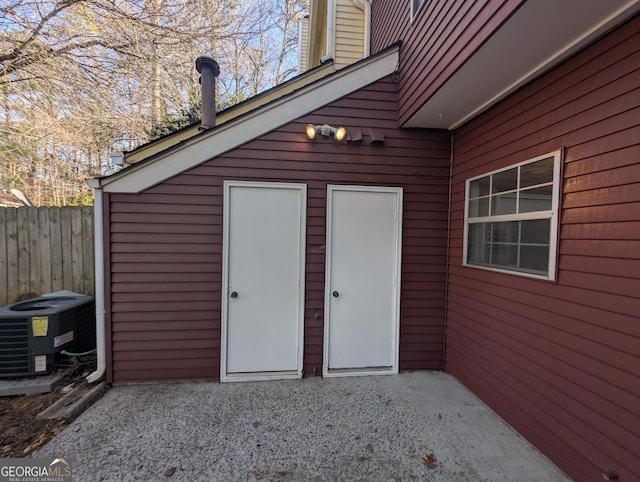 view of outbuilding with cooling unit